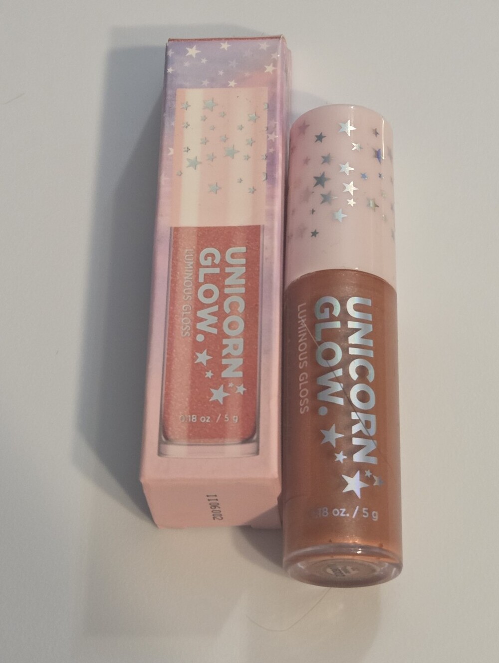 Unicorn Glow Luminous Lip Gloss in Topaz